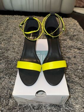 Call it Spring Black Sandals with Neon Yellow Straps